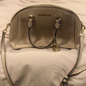 Soft pink Michael kors purse.